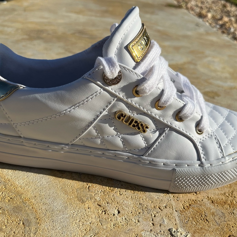 Guess white and gold sneakers size 8M plus rhinestone.
